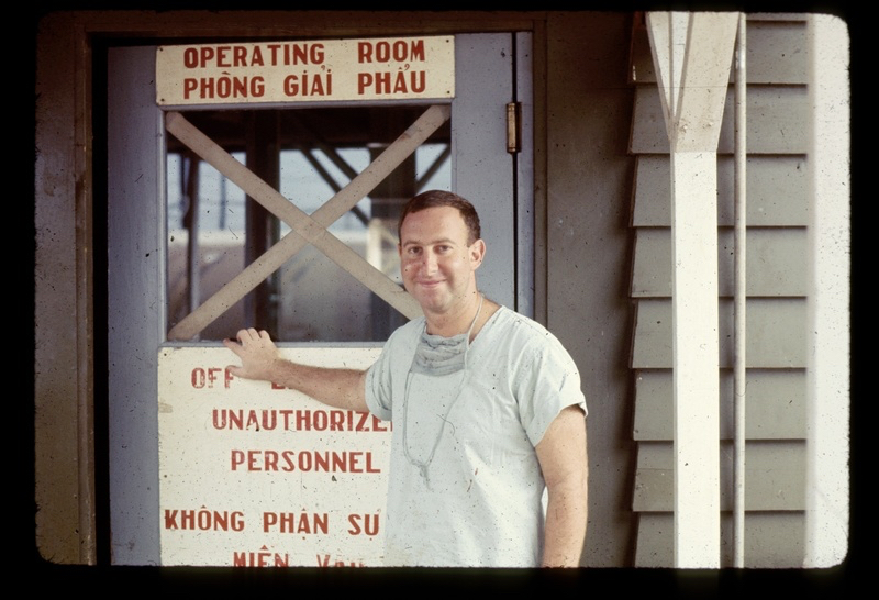 Then 29-year-old Dr. Mayer Katz prepares to enter a field hospital in Phong Giai Phau near the demilitarized zone in Vietnam in 1968. KATZ COLLECTION